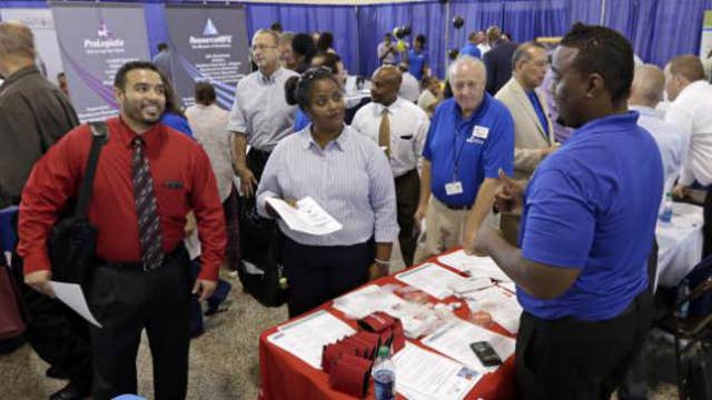 Weekly jobless claims rise to 311,000