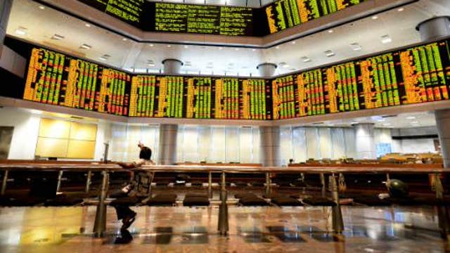 Asian shares mixed, Shanghai Composite rises to 8-month high