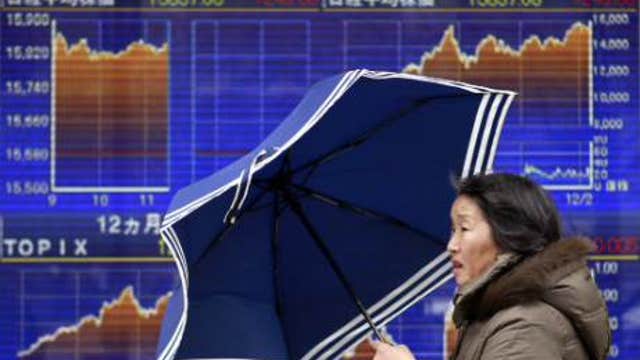 Asian investors cautious ahead of Fed minutes