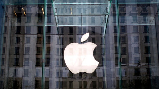 Apple shares hit record high