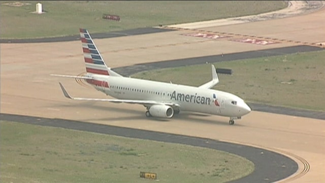American Airlines adds fees for unaccompanied minors