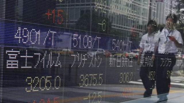 Asian markets trade mixed