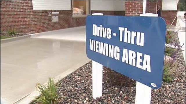 Car-side mourning: Funeral home offers drive-thru viewing