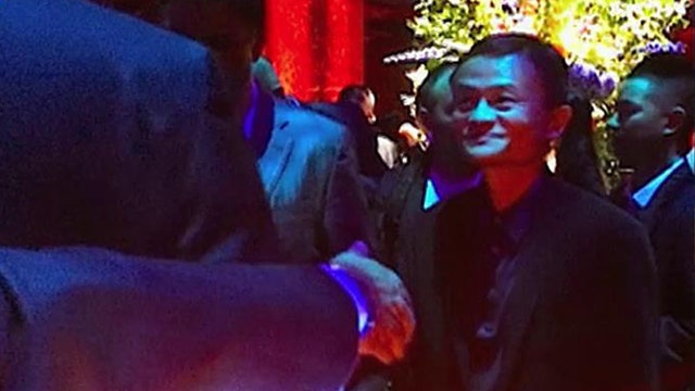 Alibaba celebrates IPO in style