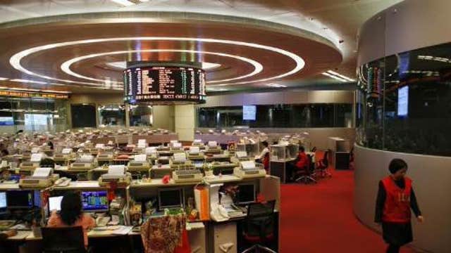 Shanghai shares lead Asian markets lower