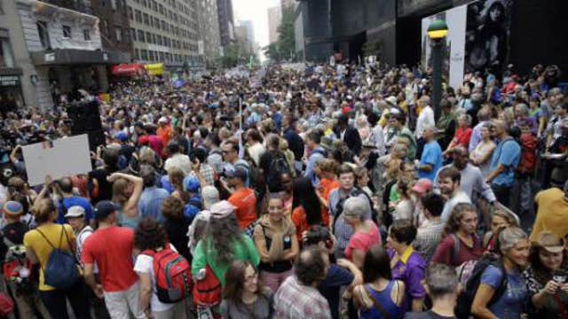 Climate change protesters head to Wall Street for sit-in