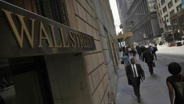 Climate change protesters ‘flood’ Wall Street