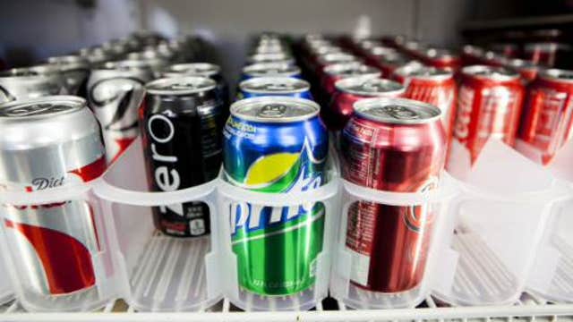 Soda companies cutting calories, pushing water?
