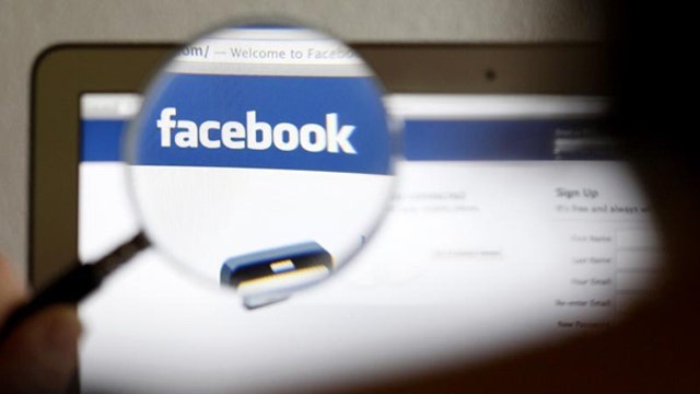 Facebook shares hit new high
