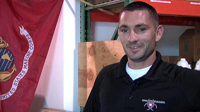 Lauren Blanchard talks to a hazmat Marine veteran who uses his military training to open up his own business