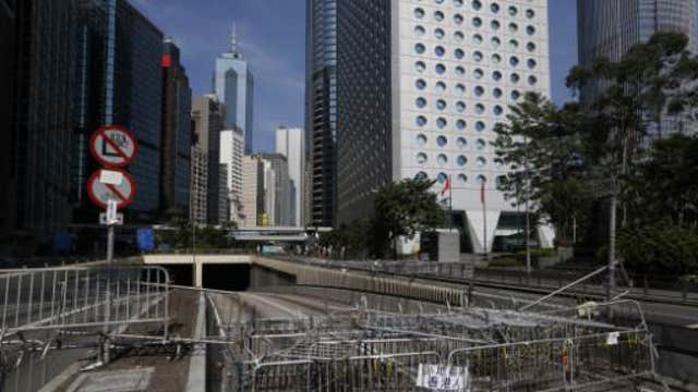Hong Kong returns to work as protests wane