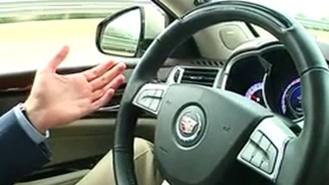 Behind the wheel of a driverless car