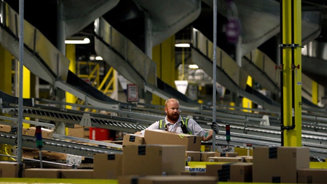 Amazon workers sue for pay for time spent on security lines