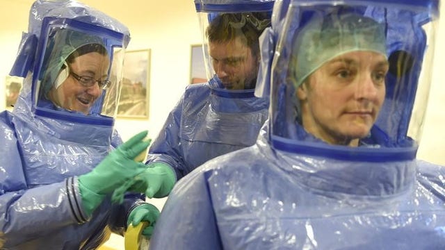 How did a nurse in full protective gear contract Ebola?