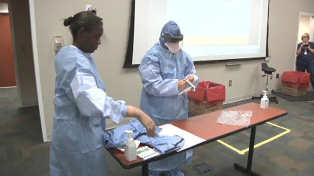 How are hospitals training for Ebola?