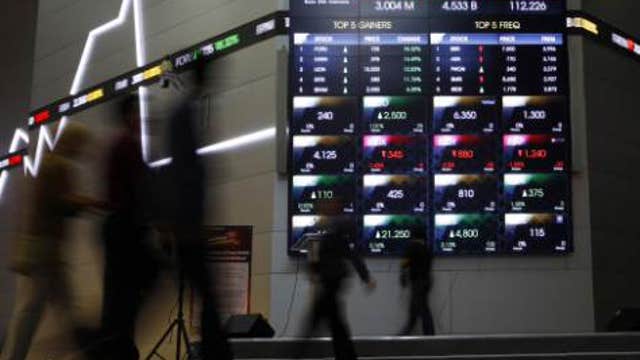 Asian shares down despite positive China data