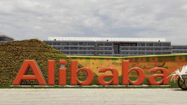 Alibaba shares approach all-time high