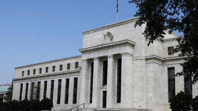 Federal Reserve announces end of QE