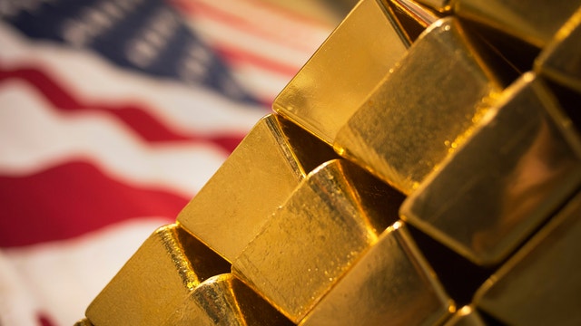 Gold near 4-year lows