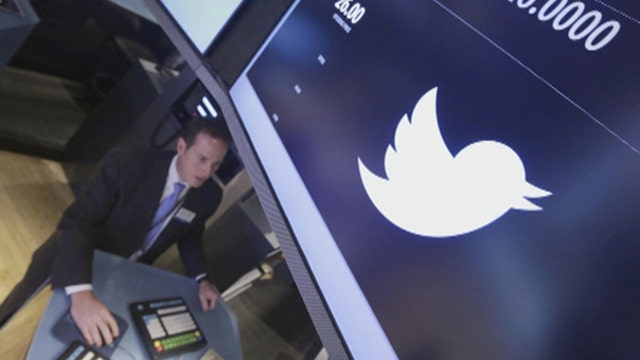 Twitter soars above IPO price in trading debut