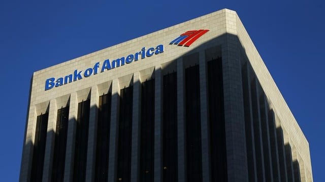 Bank of America adjusts earnings