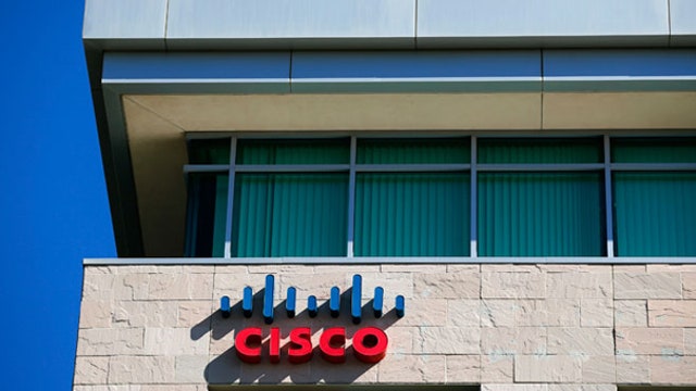 Cisco posts 1Q beat on earnings, revenue