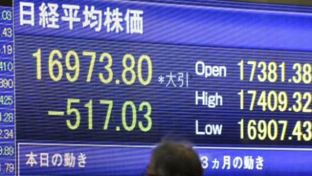 Asian shares fall on disappointing Japan data