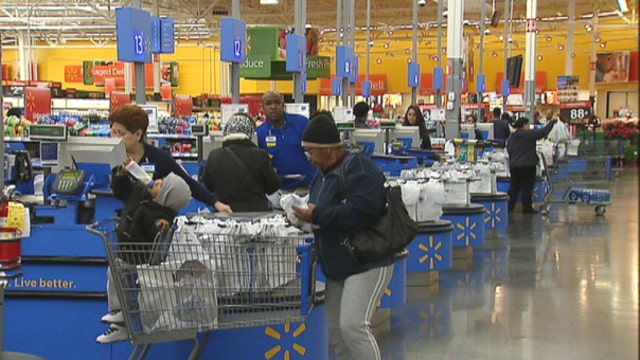 Wal-Mart CEO: Our pay is in the top half of our industry