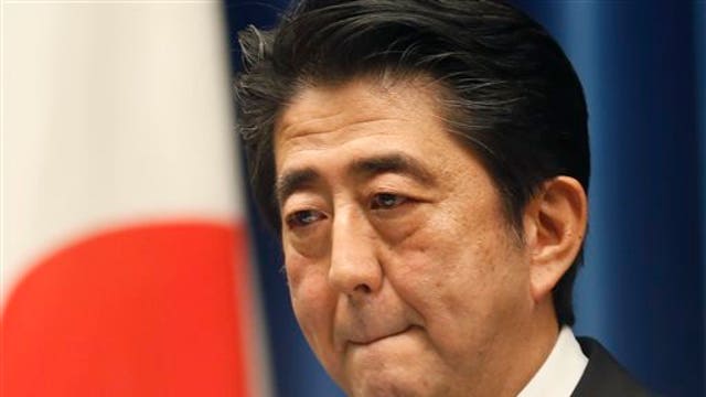 Japan’s Abe calls for snap election, puts off tax hike