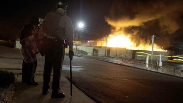 Violence erupts in Ferguson after grand jury decision