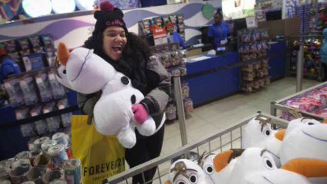 Testing out toys at Toys ‘R’ Us on Black Friday