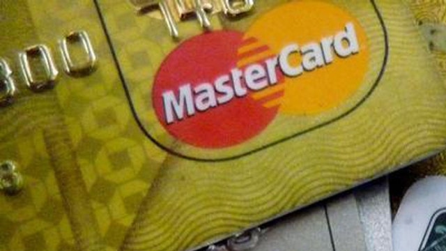 MasterCard shares rise on stock split, dividend increase