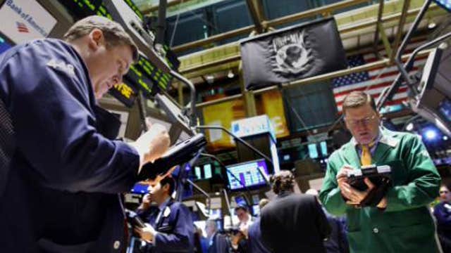 U.S. stocks rise on strong economic data
