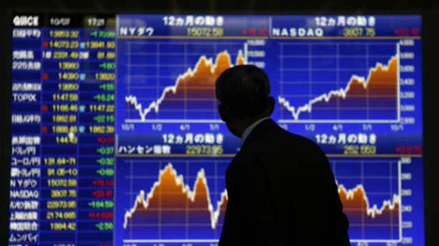 Asian shares lower on Chinese data, stronger yen