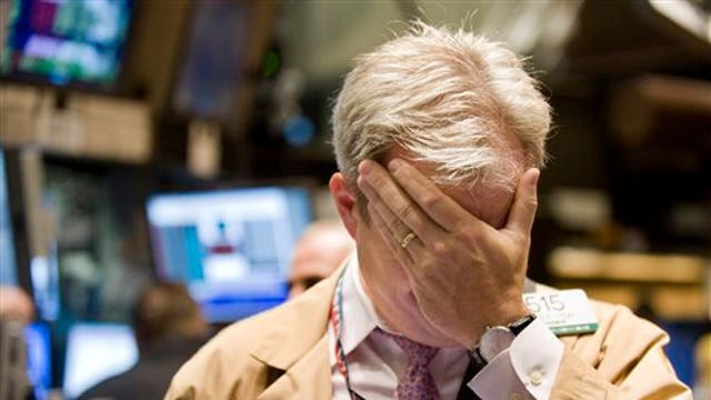 Stocks down in early action