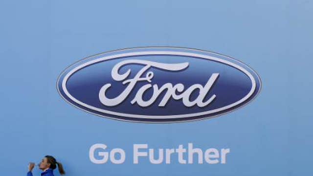 Ford expects profit fiesta for 2013, but lowers 2014 forecast