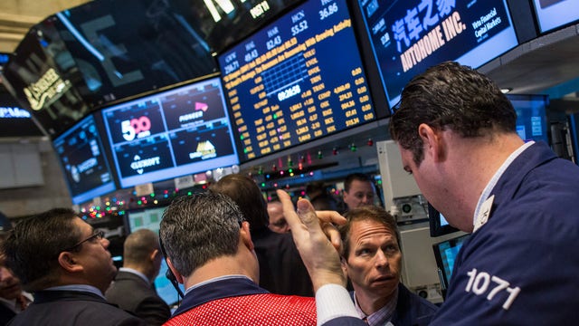 Stocks pulling back after hitting record highs