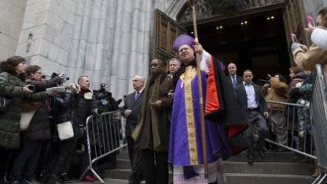 Cardinal Dolan, Catholic church respond to NYPD officer deaths