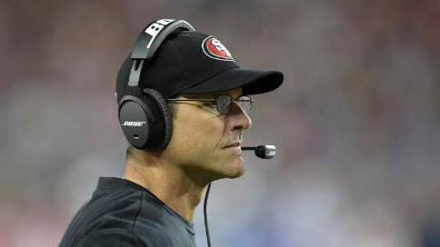 Jim Harbaugh signs with U-Mich. for 6 years, $48M