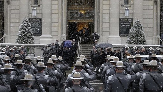 Hundreds gather for the funeral of Mario Cuomo