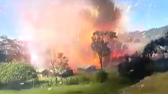 Massive fireworks explosion knocks cameraman off his feet