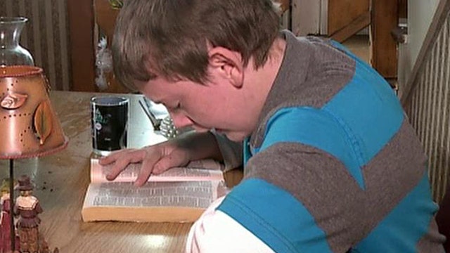 Student scolded for reading Bible in school