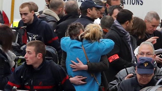 Gunmen storm office of satirical magazine in Paris