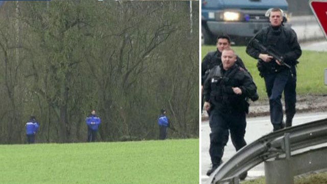 Charlie Hebdo suspects hold hostages in two locations