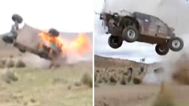 Raw video: Rally car wipes out, bursts into flames