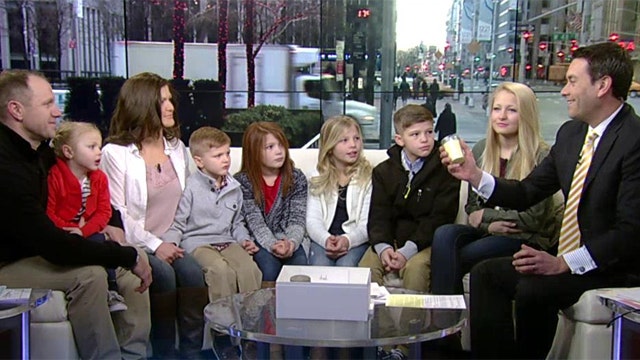 Military family of 8 cheer up dad deployed to Qatar