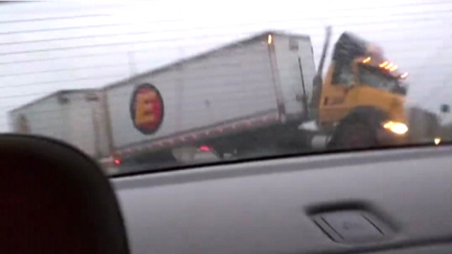 Heart-stopping tractor trailer crash caught on tape
