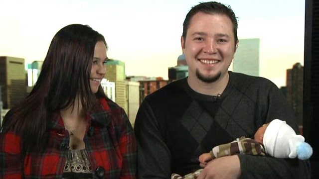 Parents deliver son in hospital parking lot