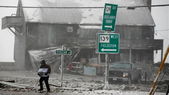 Blizzard breaches seawall in Mass. flooding neighborhood