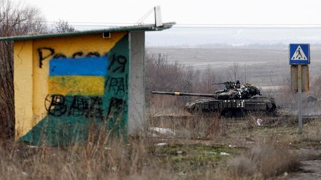 Ukraine's military exchanges fire with rebel forces